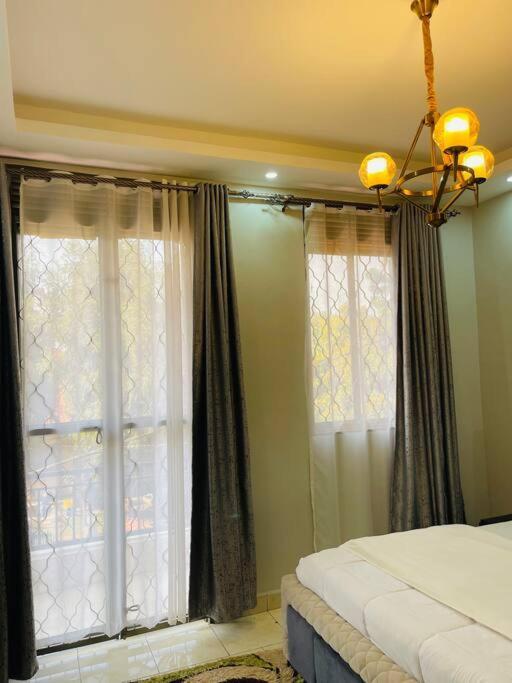 Renex Homes Namugongo Экстерьер фото